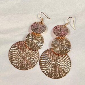 Gold tone triple play earrings, circles and movement